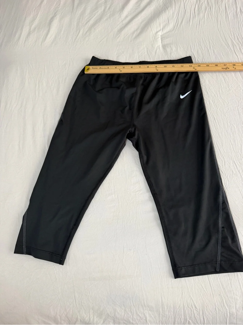 Nike women Black Cropped Athletic Leggings with White Swoosh‎